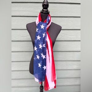 A great lightweight Red/White/Blue American Flag Scarf… 
Measures 3’ X 6’